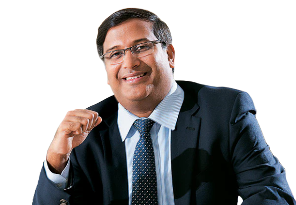 Portrait of Falgunbhai Patel, Chairman and Managing Director of The Sandesh Limited, seated and facing the camera.